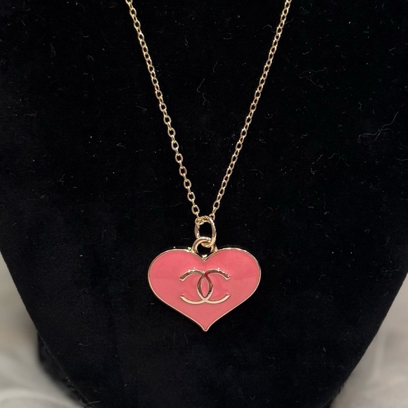 CHANEL Jewelry - CC stamped zipper pull on unbranded necklace